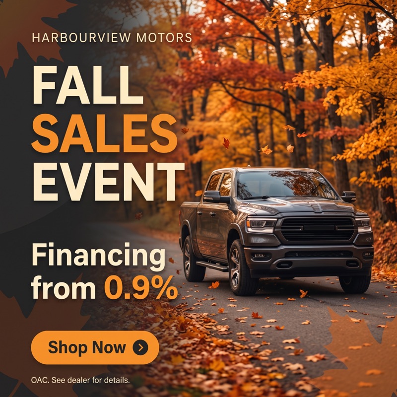 Fall Sales Event ad with a pickup on an autumn road, financing from 0.9%