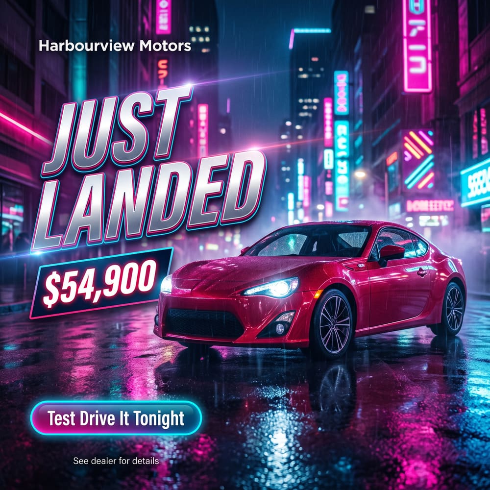 Vehicle spotlight ad: Just Landed, red sports coupe, $54,900